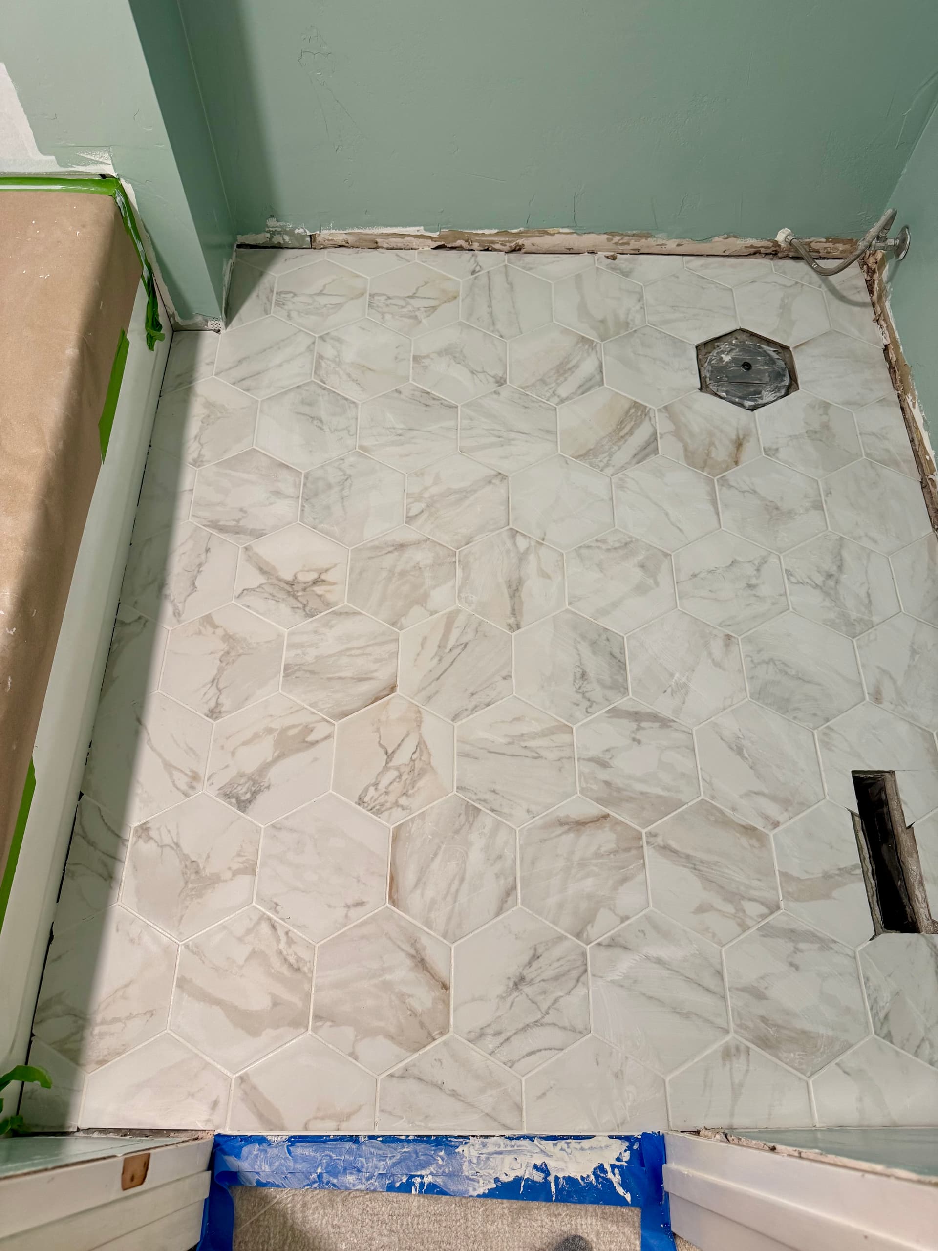 Gallery photos for Bathroom Floor Tile Going In and It's Already Looking Sharp: Image #1